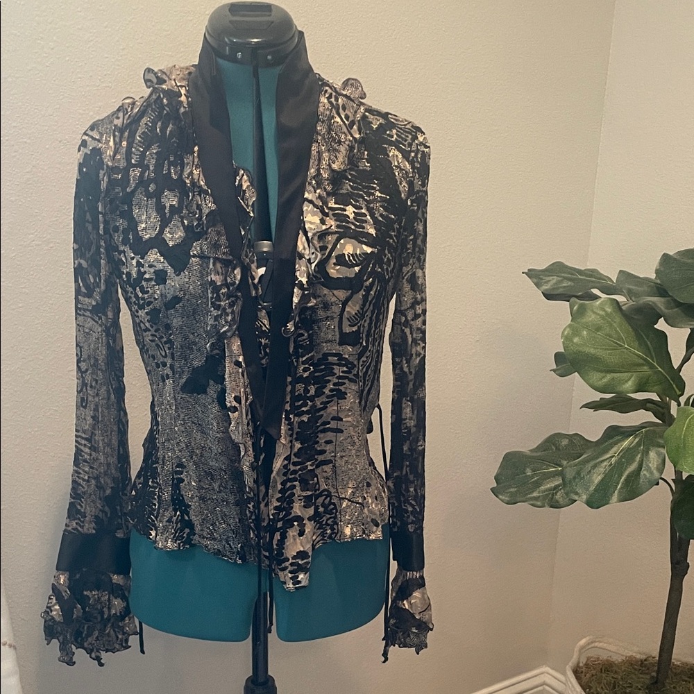 Metallic gold and black wrap blouse.